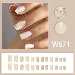 Detail view of 24pcs W671 reusable floral press-on nails with gold foil and leaf patterns