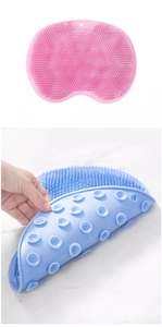 Close-up of silicone bath brush bristles and back suction cups for wall mounting