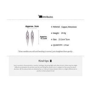 Detailed size specifications for rhinestone tassel earrings measuring 15.3cm by 3cm