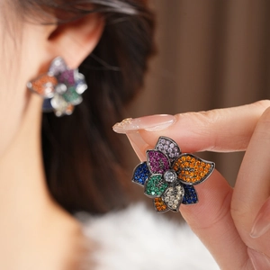 Vintage style floral stud earring with multi-colored crystals and black plated alloy base