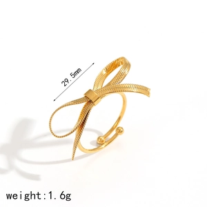 Gold bow-knot ring with snake chain metal texture and adjustable open band design