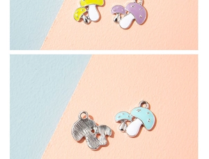 Detail of colorful mushroom alloy enamel pendants for DIY jewelry and keychains
