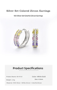 Macro detail of S925 silver earrings with colorful cubic zirconia and rhodium plating