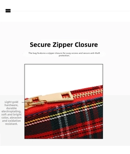 Detailed macro view of light gold metal zipper on red plaid baguette bag texture