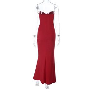 Back view of elegant red satin fishtail evening gown with a slim fit floor-length silhouette