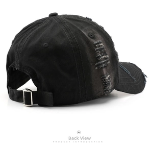 Rear view of black vintage washed baseball cap featuring distressed ripped details and buckle