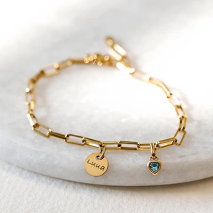 Gold rectangular chain bracelet with personalized Luna round tag and blue heart pendant