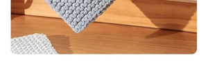 Macro detail of thick woven cotton rope placemat showing texture and heat resistance