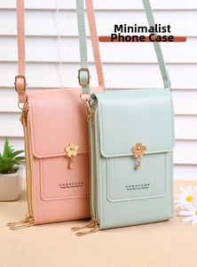 Vertical phone purses in pink and green faux leather with floral metal charms and zippers