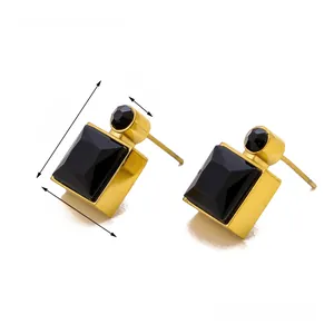 Detailed view of gold square stud earrings with black stones showing 1.5cm height dimension