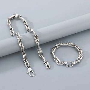 Polished 10mm silver pig nose chain set with necklace and bracelet on gray display