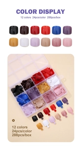Detailed display of 12-color solid press-on toenails in a transparent storage box