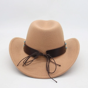 Close-up of felt cowboy hat with leather band, turquoise beads and metal rivets