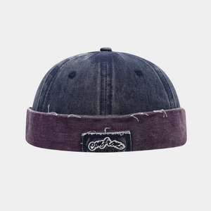 Retro washed denim docker cap with vintage patch and color-block street style design