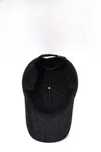 Detail of winter baseball cap showing warm ear flaps and thick black fleece lining