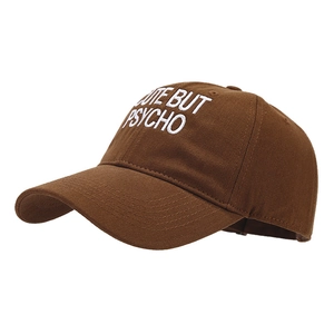 Brown cotton baseball cap with CUTE BUT PSYCHO white embroidery and retro soft top
