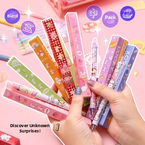 Close-up of assorted colorful cartoon blind box gel pens held in a fanned-out display
