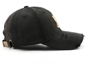 Detailed side view of distressed charcoal cotton baseball cap with ripped brim detail