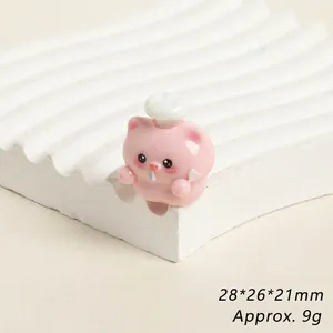 Macro view of a cute pink resin pig figurine with 28x26x21mm dimensions and 9g weight