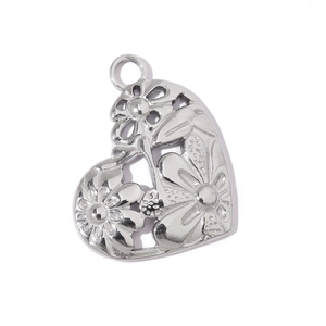 Macro view of silver heart-shaped hollow flower pendant in polished titanium steel