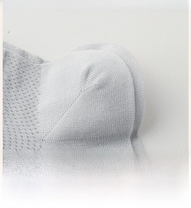 Close-up of reinforced heel design on light gray breathable cotton mesh socks for men