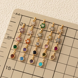 Set of 6 golden hexagonal flower pendants with multi-color cubic zirconia birthstones