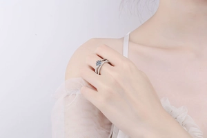 Detail of cross镂空 S925 sterling silver ring with sparkling round moissanite stone