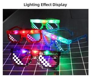Macro view of four glowing LED pixel mosaic glasses in red, green, blue, and black