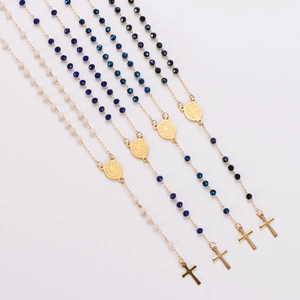 Vintage stainless steel beaded necklace with religious medal and gold crucifix cross