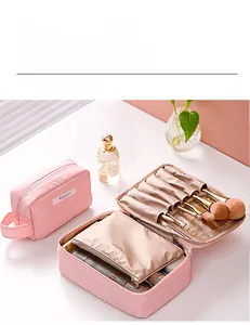 Trousse à maquillage rose imperméable avec compartiments pour pinceaux et cosmétiques