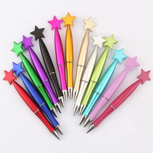 Set of 13 colorful ballpoint pens with metallic star tops for holiday gifts