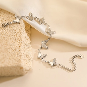 Elegant stainless steel butterfly link bracelet with polished silver finish for women