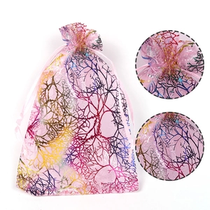 Pink coral pattern organza drawstring gift bag with iridescent gold foil branches