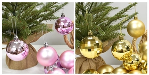 Detail of pink and gold Christmas balls in glossy, matte, and disco textures