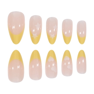 French almond fake nails with yellow tips and white star patterns in a 10-piece set