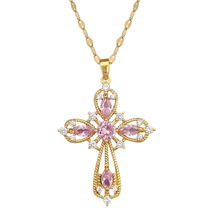 Titanium steel hollow cross necklace with pink and clear crystals on white background