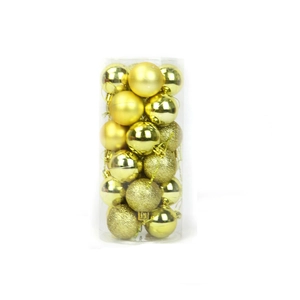 Golden Christmas balls in assorted finishes displayed in a clear cylindrical plastic tube