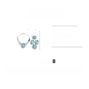 Detail view of oval teal acrylic stones on a vintage silver necklace, bracelet and earrings set