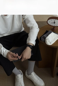 Detail of ribbed cuffs on antibacterial combed cotton business crew socks for men