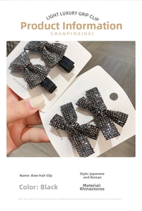Close-up of black rhinestone bowknot hair clips featuring sparkling full-drill details