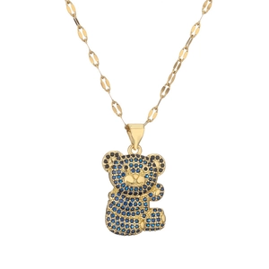 Cute gold bear pendant necklace with blue and black micro-inlaid rhinestones on white background