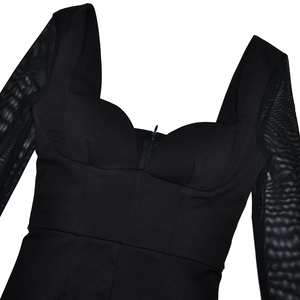 Detail of black sexy dress with mesh long sleeves and front zipper closure design