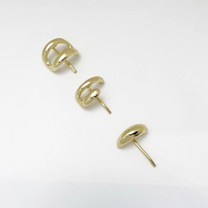 Three-piece minimalist gold geometric stud earrings set with high-polished metallic finish