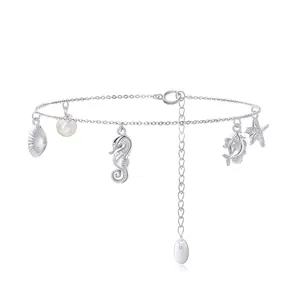 S925 sterling silver ocean charm bracelet featuring sea shell, seahorse and pearl charms