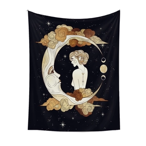 Detail of artistic black and gold tapestry showing moon goddess with celestial stars