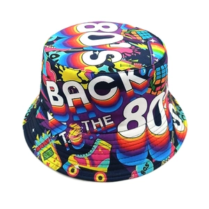 Top-down view of retro 80s bucket hat with colorful tape and rainbow prints