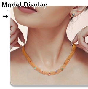 Close-up of a golden mesh weave necklace featuring colorful vibrant zircon gemstones