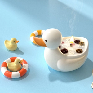 Duck shaped resin aromatherapy candle mold with dried flowers and star decorations