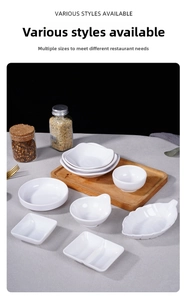 Detailed view of various white melamine sauce dishes and dip bowls on a wooden tray
