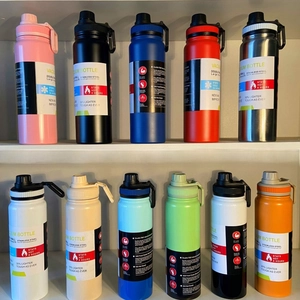 Various colored 304 stainless steel vacuum insulated bottles displayed on a shelf
